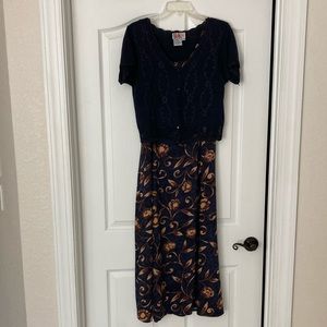 2 piece navy dress with embroidered sweater.
